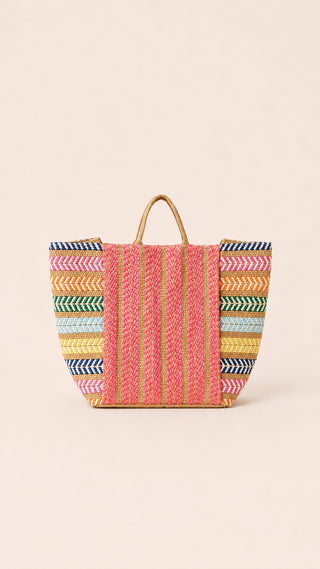 Grosse schöne Strandtasche der schweizer Marke AYRE. Aus Stroh und gewobenen Stoffstreifen in der Hauptfarbe pink und rosa, mit seiltlichen einem bunten Mix an Farben.